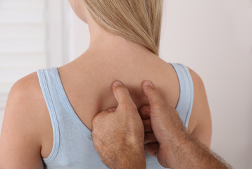 Chiropractic treatment, Back pain relief. Physiotherapy / Kinesiology for female patient, sport...
