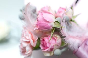 Fototapeta na wymiar Wedding decorations. Decoration of holidays with fresh flowers. Pink roses and carnations.