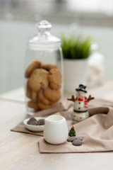 Bar counter in a coffee shop with New Year's decorations, cookies, sweets and coffee