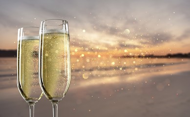 Two glasses of champagne isolated on white background