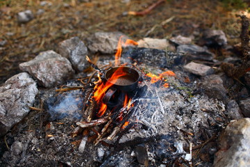 Bonfire coffee mug with smoke and fire on a picnic nature