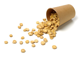 Chinese Herbal medicine - Astragalus slices, Huang Qi (Astragalus propinquus) on white background 