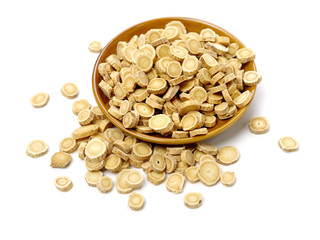 Chinese Herbal medicine - Astragalus slices, Huang Qi (Astragalus propinquus) on white background 