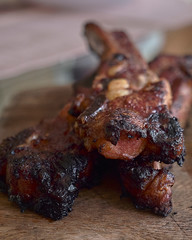 pork ribs golden brown over the grill on a table