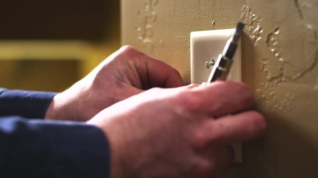 Slow motion, installing light switch cover