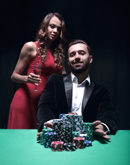 Young couple playing poker