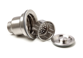 closeup of kitchen drain assembly on white background