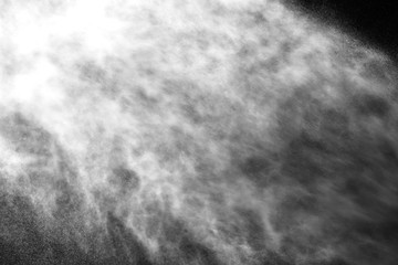 A stream of water and a cloud of drops