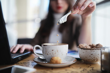 Girl eating coffee cakes