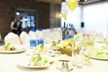 Glasses on the table in the restaurant. Table setting.