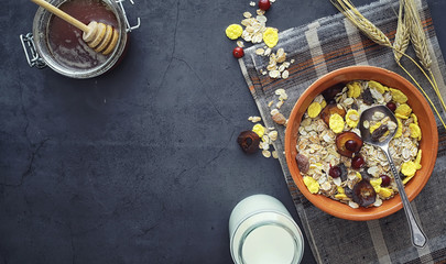 Healthy breakfast. Muesli from cereals with milk berries.