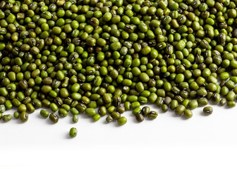 a group of dried green mung beans