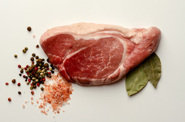 Fresh pork with ingredients for cooking. Steak preperaton Raw Pork
