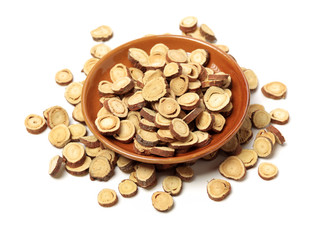 Licorice roots on white background