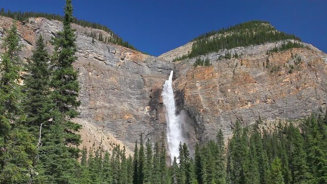 Takakkaw Falls located in Yoho National Park, British Columbia, Canada which is fed by the meltwater of the Daly Glacier