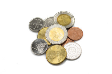 A close up image of an assorted, shiny collection of coins from Egypt.  Shot close up in macro.