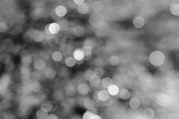 Bokeh, white round shape, abstract on a black background 