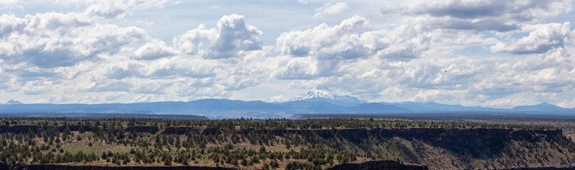 Beautiful View of The Cove Palisades State Park during a cloudy and sunny summer day. Taken in Oregon, United States of America.