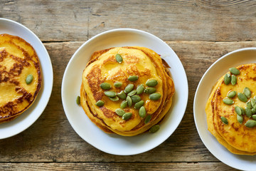 Pumpkin pancakes with seeds and honey