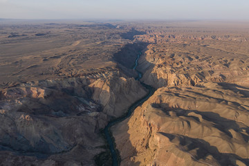 Fototapeta na wymiar Aerial view of the Charyn Canyon and Charyn River in Kazakhstan, Central Asia, at sunset
