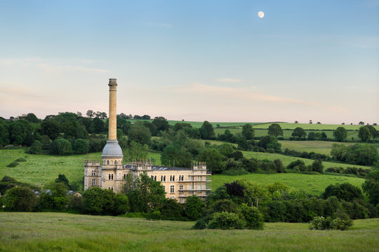 Bliss Tweed Mill in Chipping Norton England a previous wool mill for tweed converted to apartments in the evening under a gibbous moon