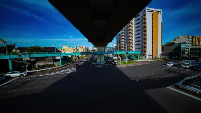 A timelapse of downtown street at Kanpachi avenue in Tokyo daytime wide shot