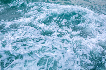 Fototapeta na wymiar ocean wite soft wave on white sandy baech background.