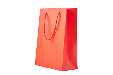 Red paper shopping bag isolated on a white background