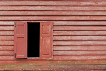 Vintage window at house. Old wooden house wall. wood window.