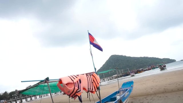 Cambodian flag shown in iconic Cambodian environment