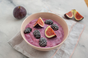 healthy yogurt with fresh figs on a table