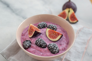 healthy yogurt with fresh figs on a table