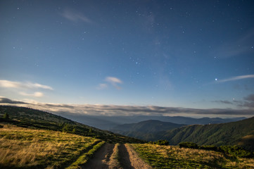 Obraz premium Moonlit night in the Carpathian mountains