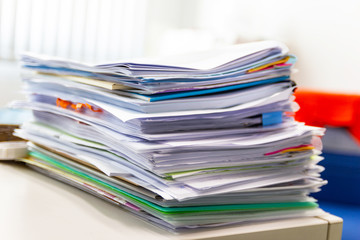 file folder and Stack of business report paper file on the table