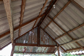 Interior view of wooden roof structure. Roof structure.