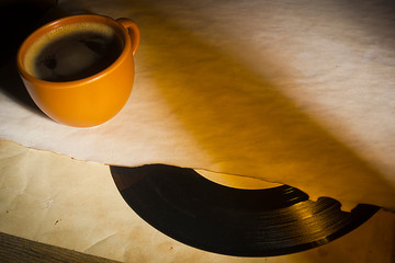 Vinyl record and a cup of coffee