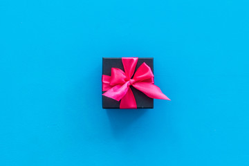 presents in boxes on blue background top view copyspace