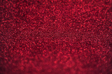 Bright sparkle red background. Holiday and festive concept.