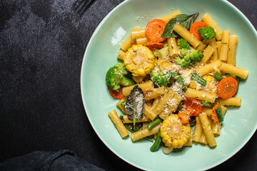 pasta vegetables salad (tasty and healthy, Italian cuisine) menu concept. food background. copy space. Top view