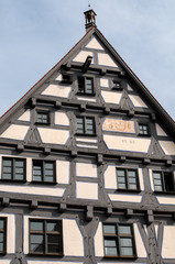 Fototapeta na wymiar half-timbered facade of renovated medieval house in Ulm, Germany