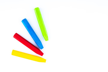 colorful crayons on white background