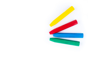 colorful crayons on white background