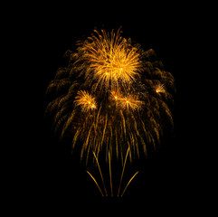 Golden exploded fireworks isolated on black background