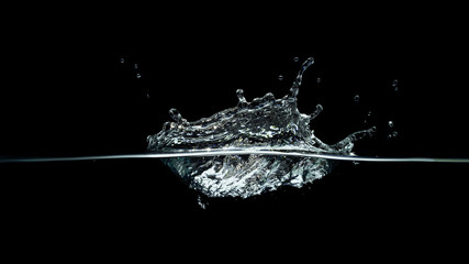 water splash isolated on dark black background