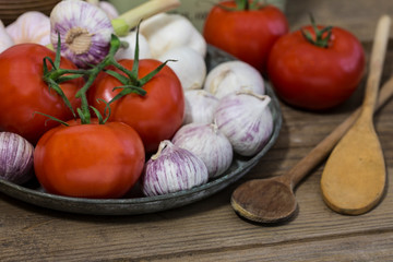 Obraz na płótnie Canvas Mediterranean Cuisine Still Life With Tomatoes