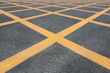 Traffic asphalt road cross paint line network low angle close-up