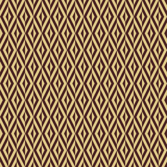 Seamless background for your designs. Modern brown and golden ornament. Geometric abstract pattern