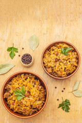 Stewed (braised) cabbage served on ethnic ceramic bowl