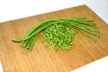  Long hatched beans Placed on a wooden floor in a white background