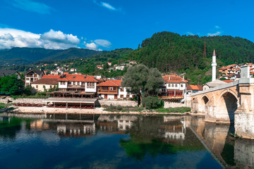 Fototapeta premium Neretva River and Houses with Old Bridge